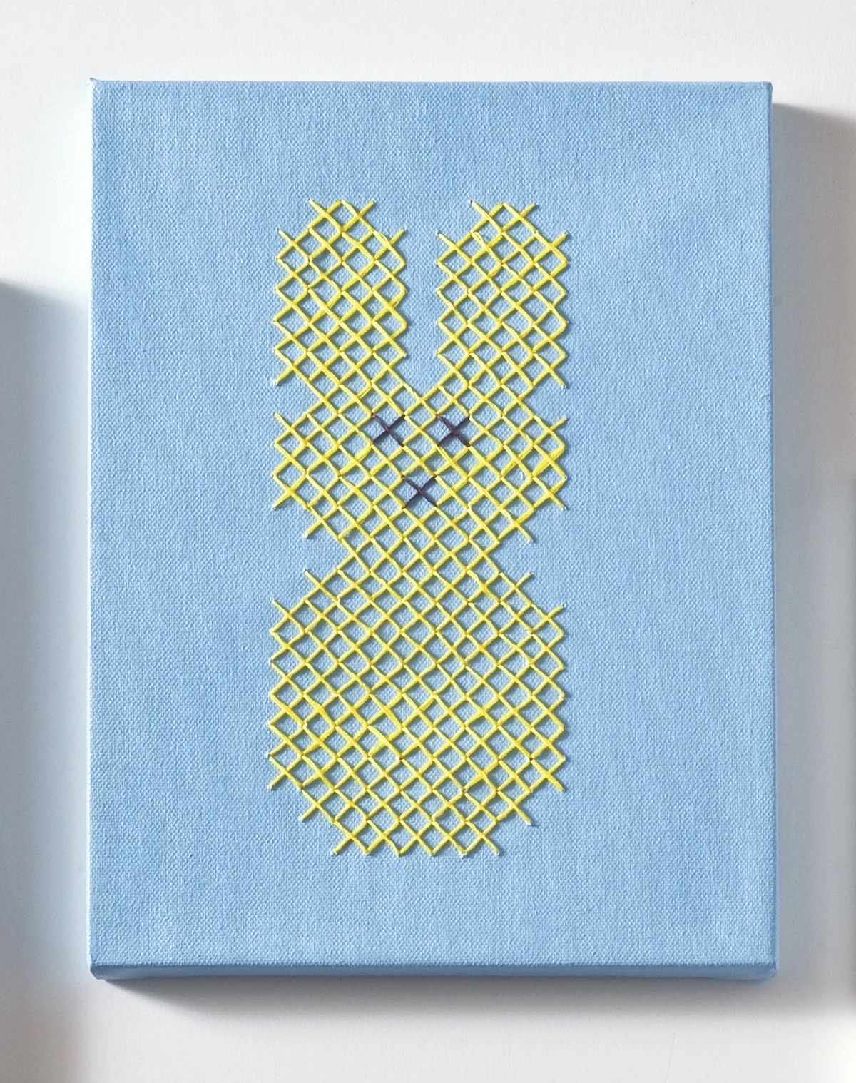 Blue Easter canvas with a yellow bunny Peep