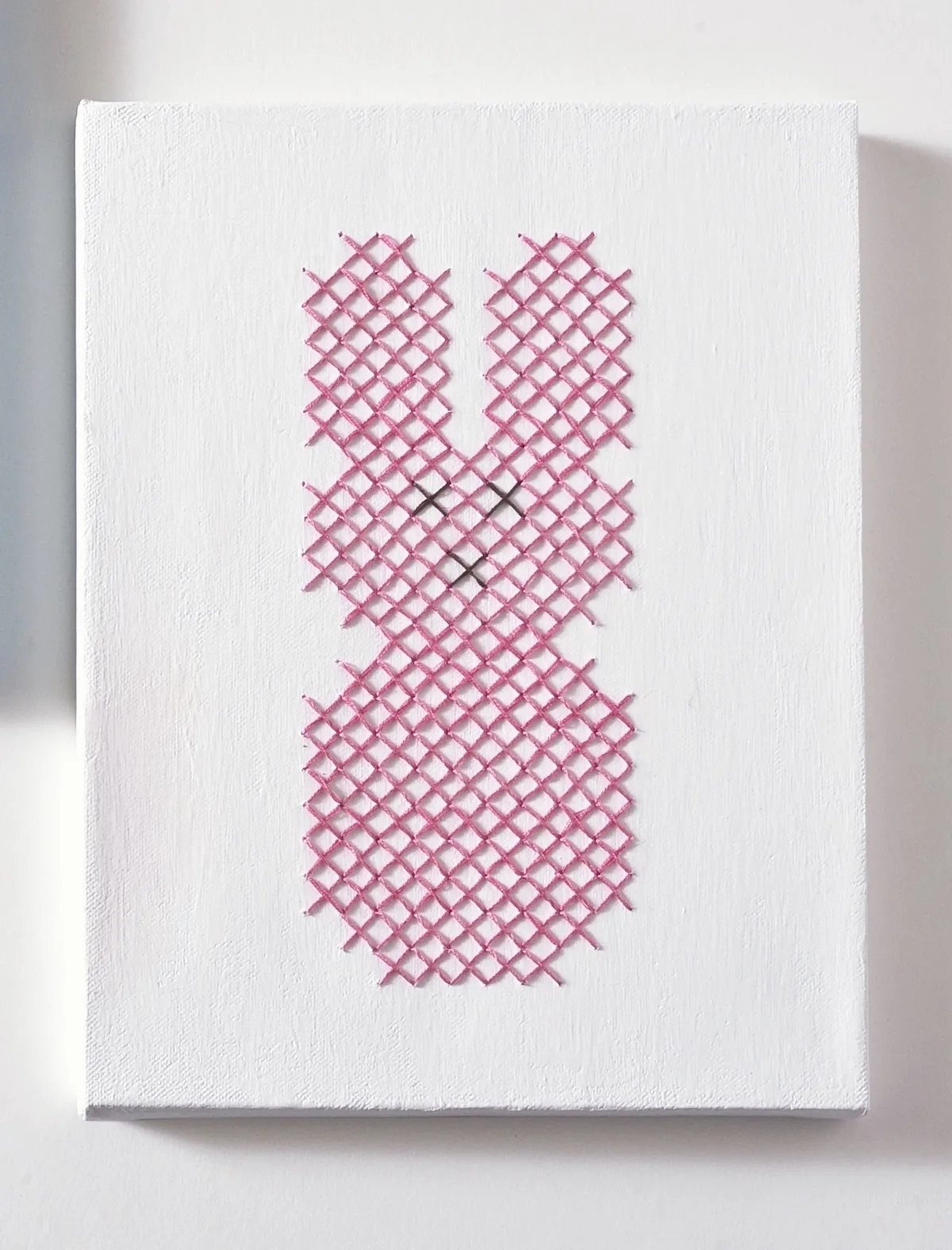White Easter canvas with a pink bunny Peep