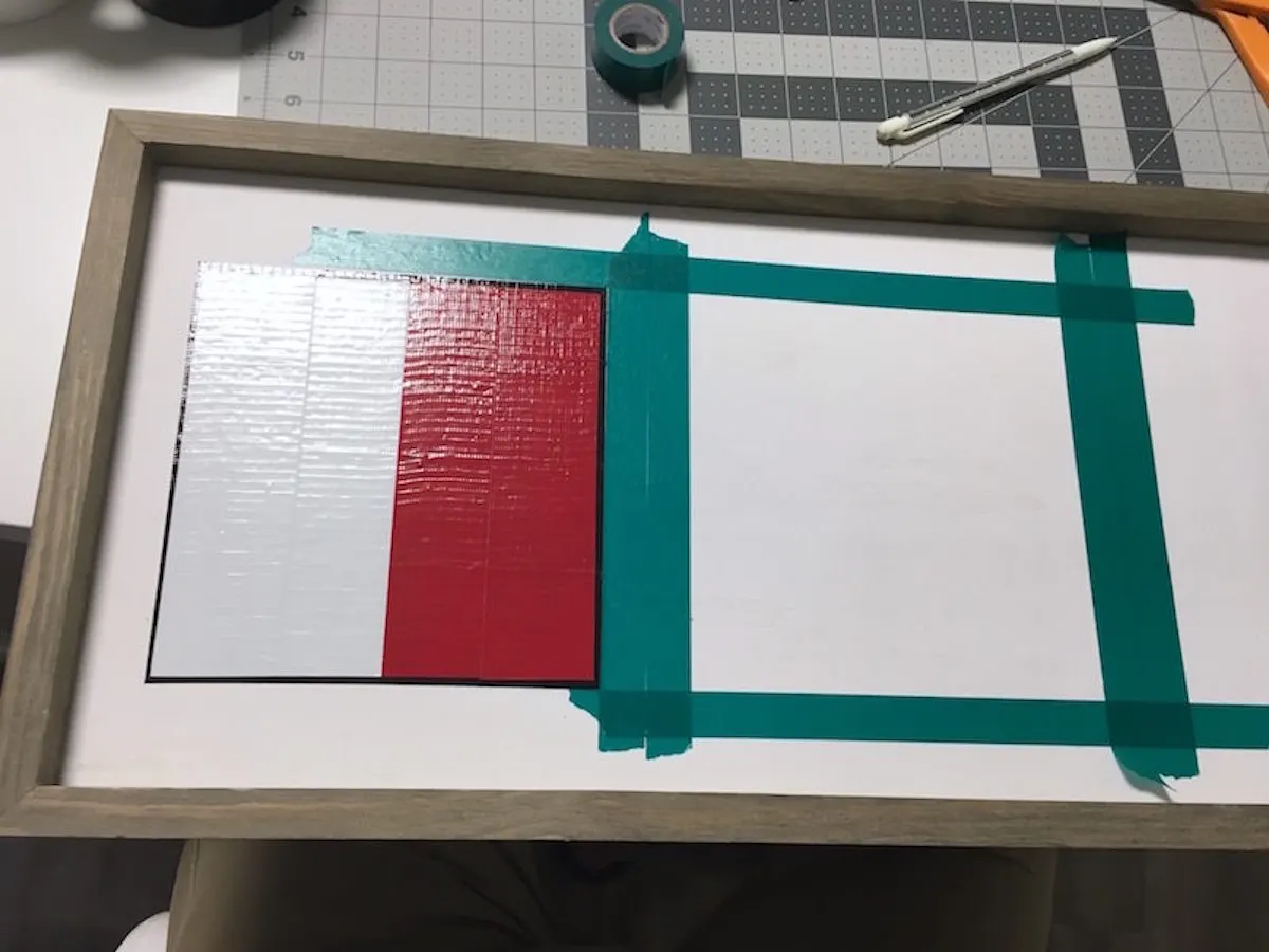 Taping off another square on the white board