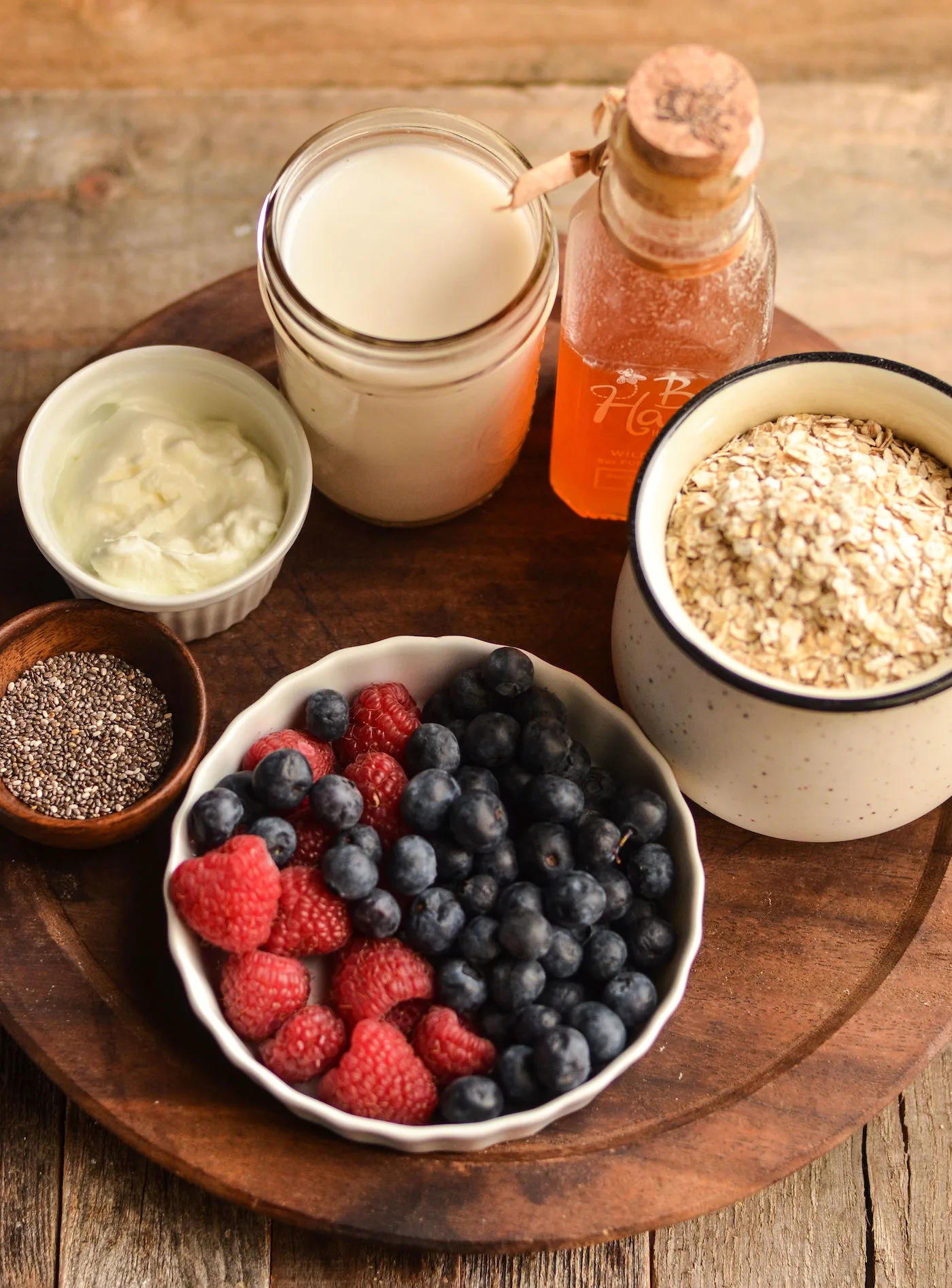 Mixed berries, chia seeds, yogurt, almond milk, old fashioned rolled oats, and honey