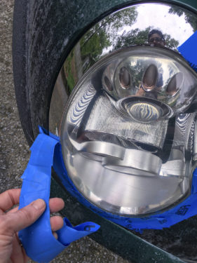 Removing painter's tape from the DIY headlight restoration