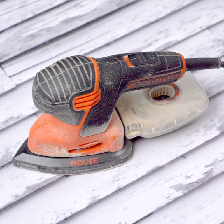using a hand sander