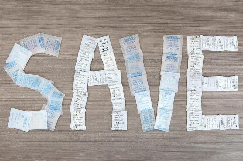 Silica gel packets spelling the word Save