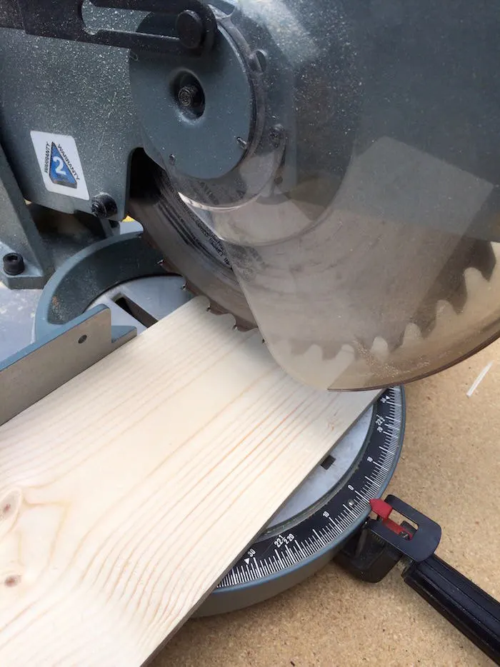 Using a circular saw to cut a piece of wood