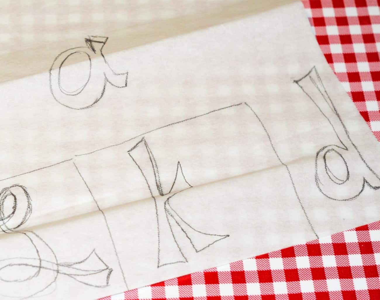 Letters drawn onto a steam-a-seam sheet with pencil