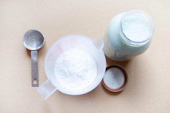 Baking soda poured into a measuring cup
