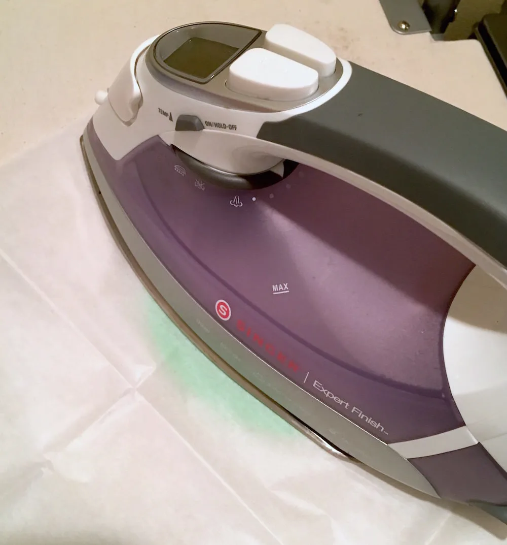 Ironing on top of ironing paper