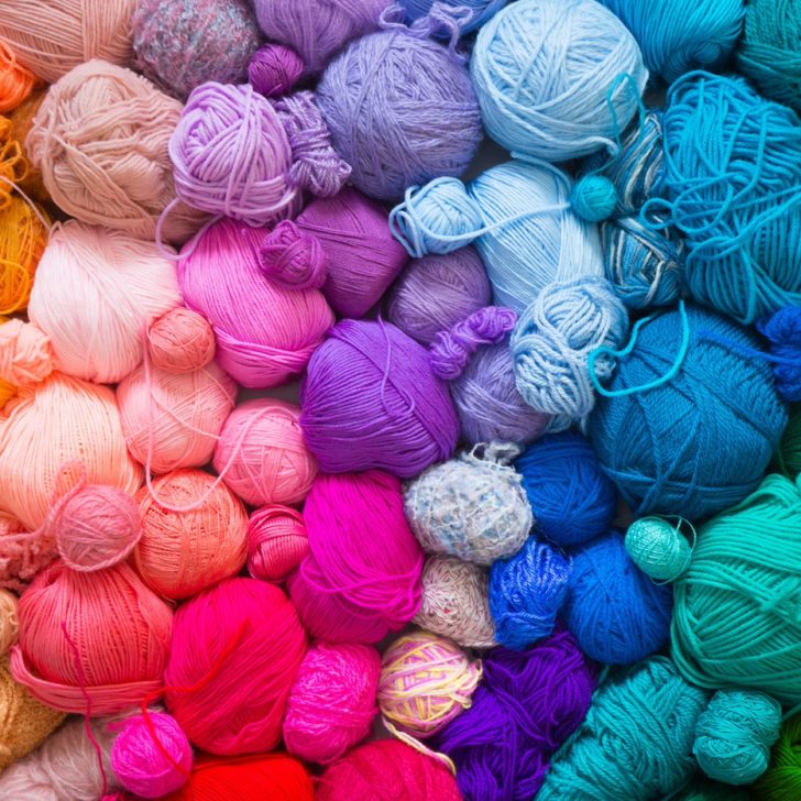 Pile-of-rainbow-yarn-in-various-colors