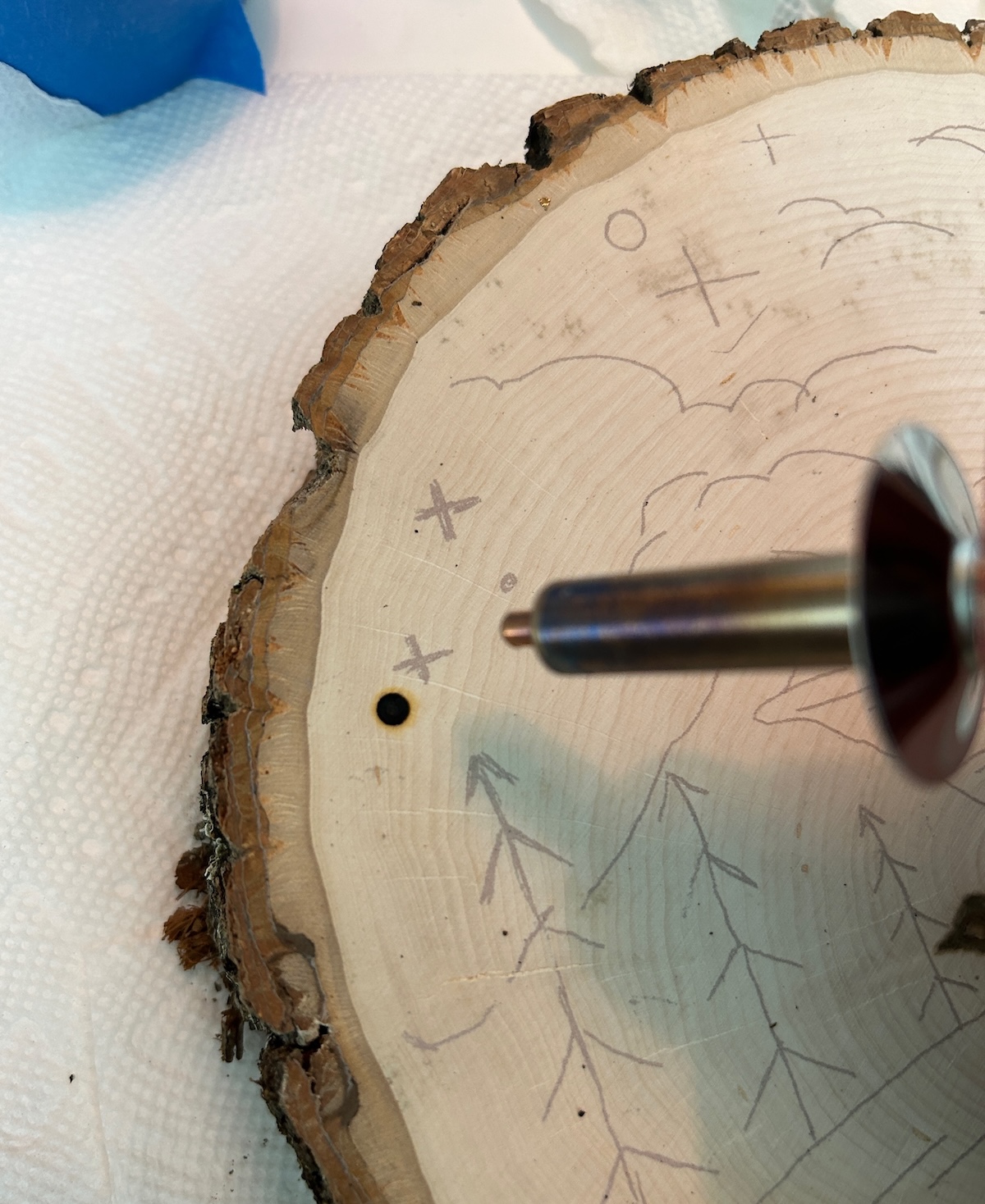 adding details with a wood burning tool