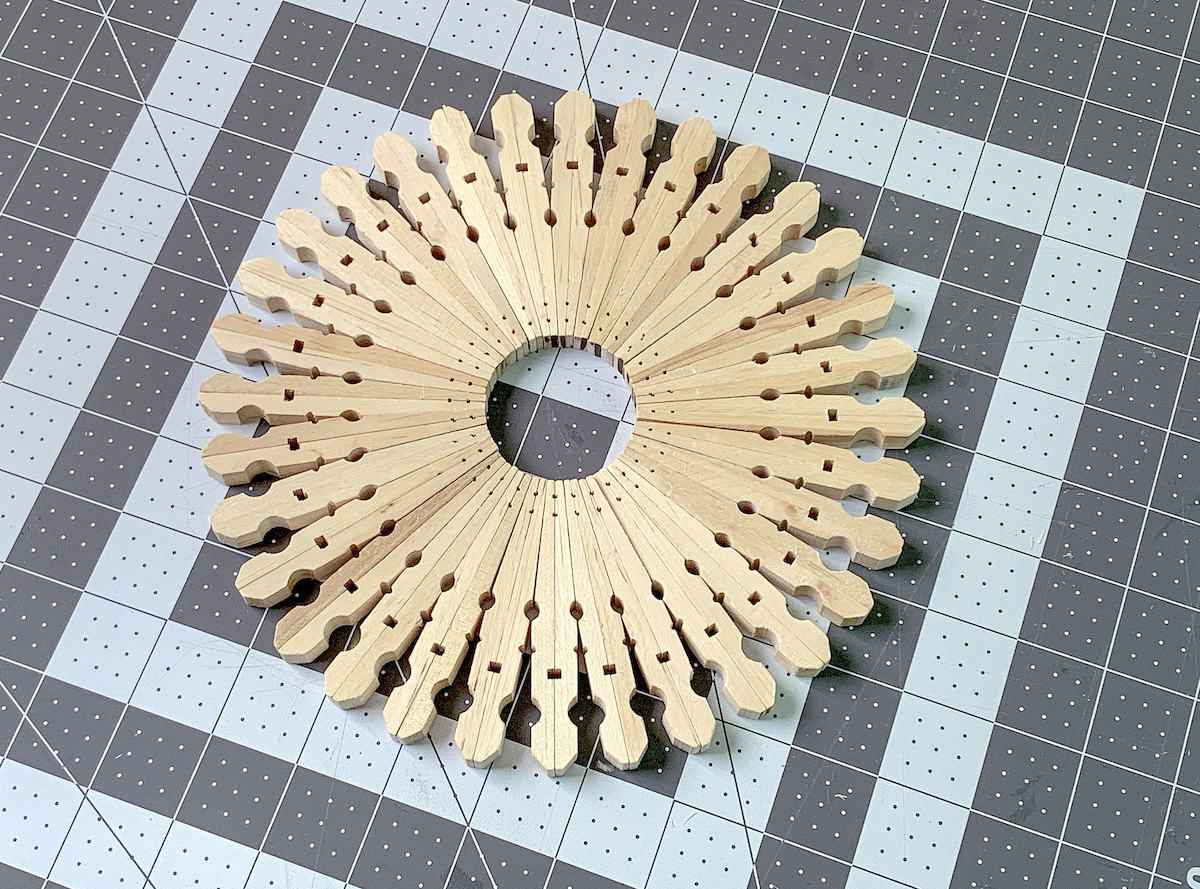 Glue clothespin trivet