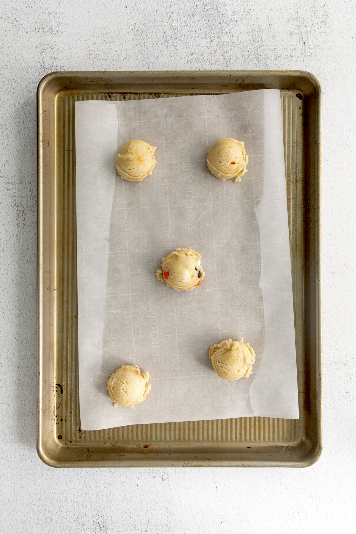Raw Halloween cookie dough on a baking sheet