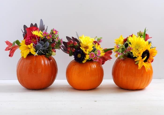 mini pumpkin vases with fresh flowers