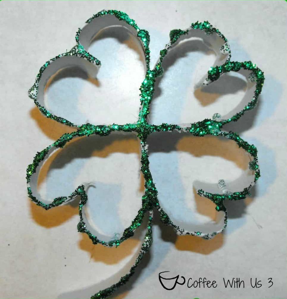 Glittery shamrock from a toilet paper roll