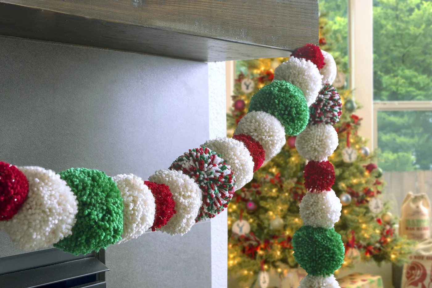 Pom Pom Christmas Garland To Decorate for the Holidays - DIY Candy