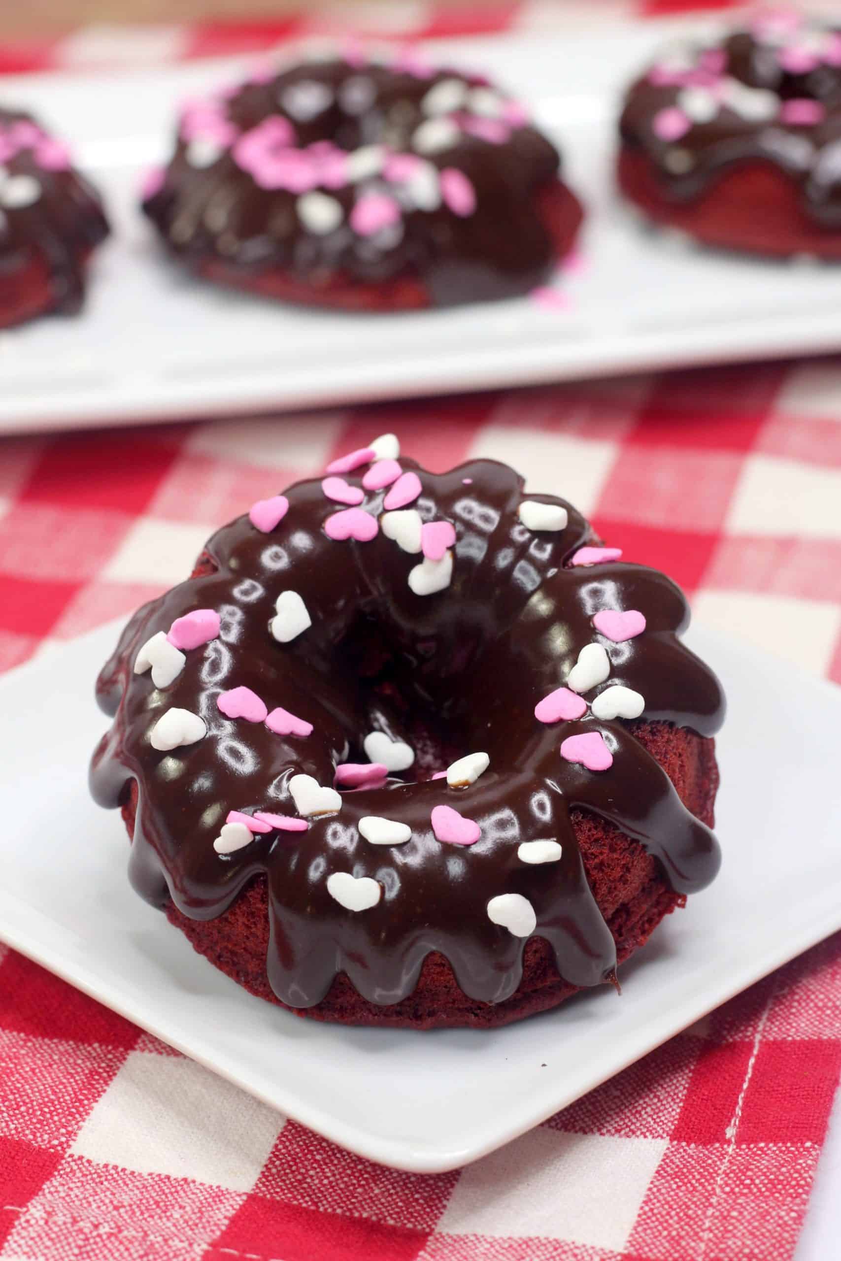 red velvet baked donuts with a chocolate ganache