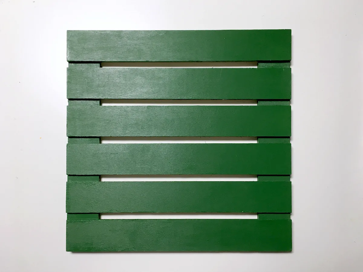 Green painted small wood pallet