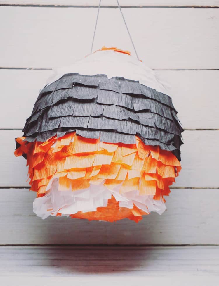 Halloween Piñata with orange and black