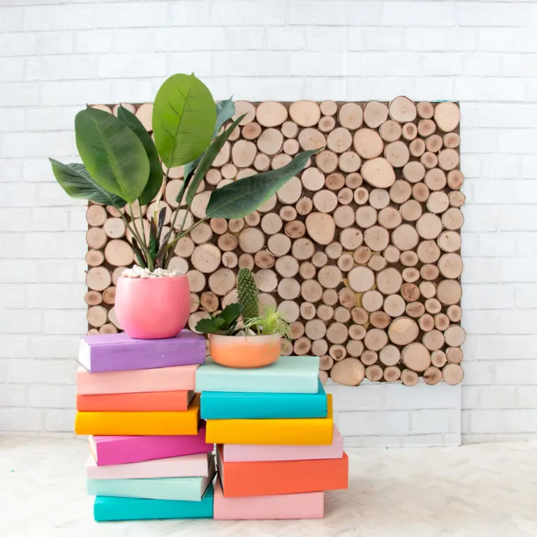 DIY colorful stacked book plant stand