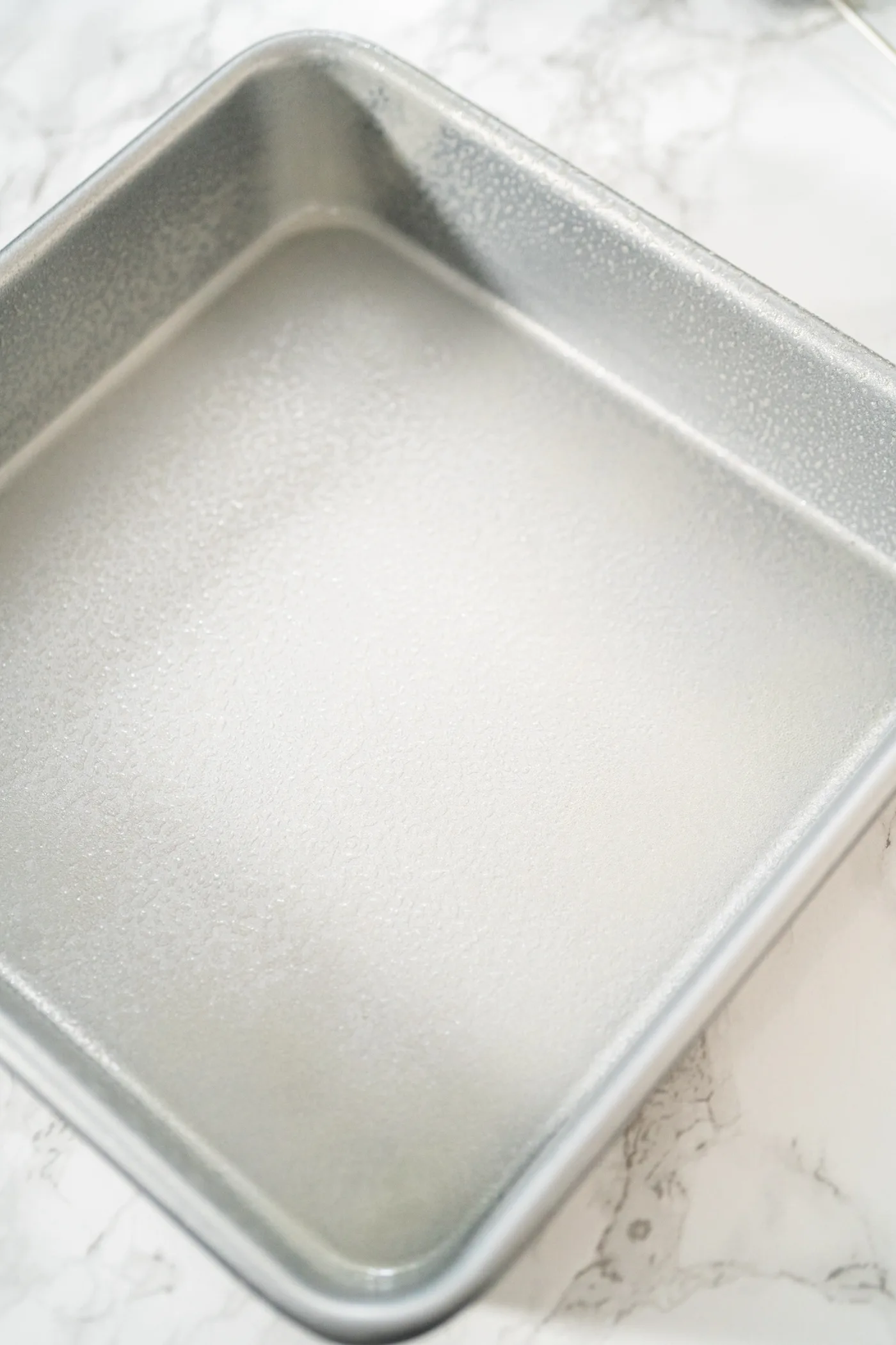 Square-baking-pan-greased-with-butter