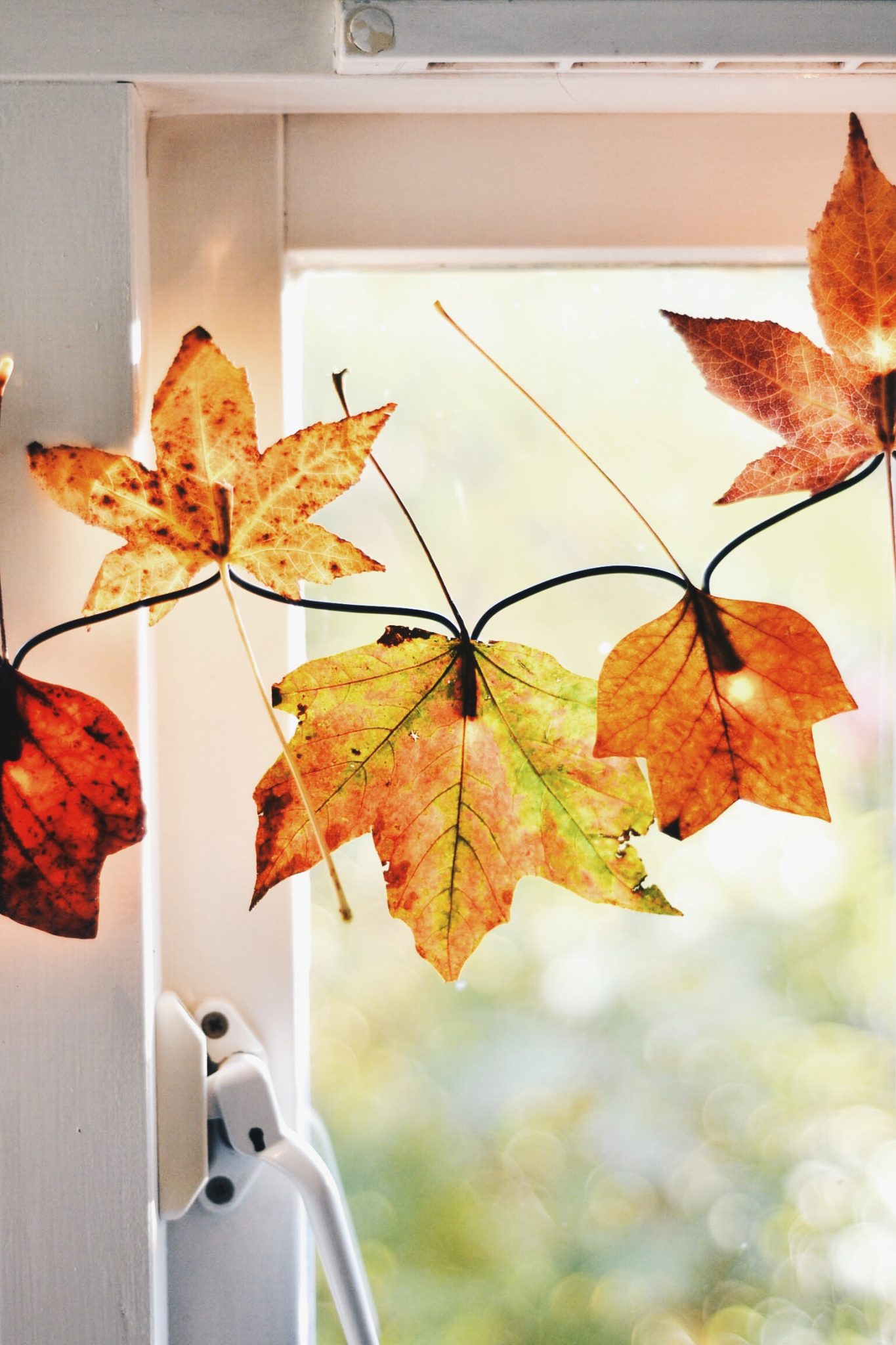 DIY autumn leaf garland with fairy lights