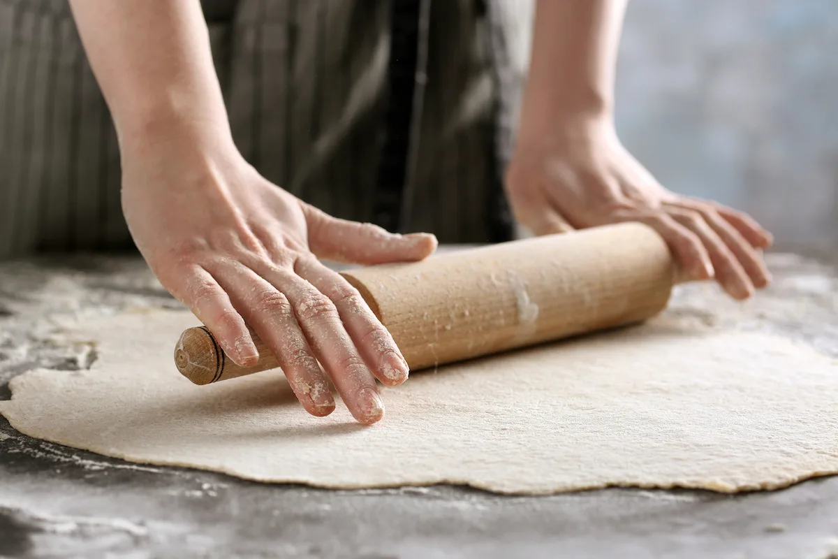 Rolling-the-dough-out-on-a-surface