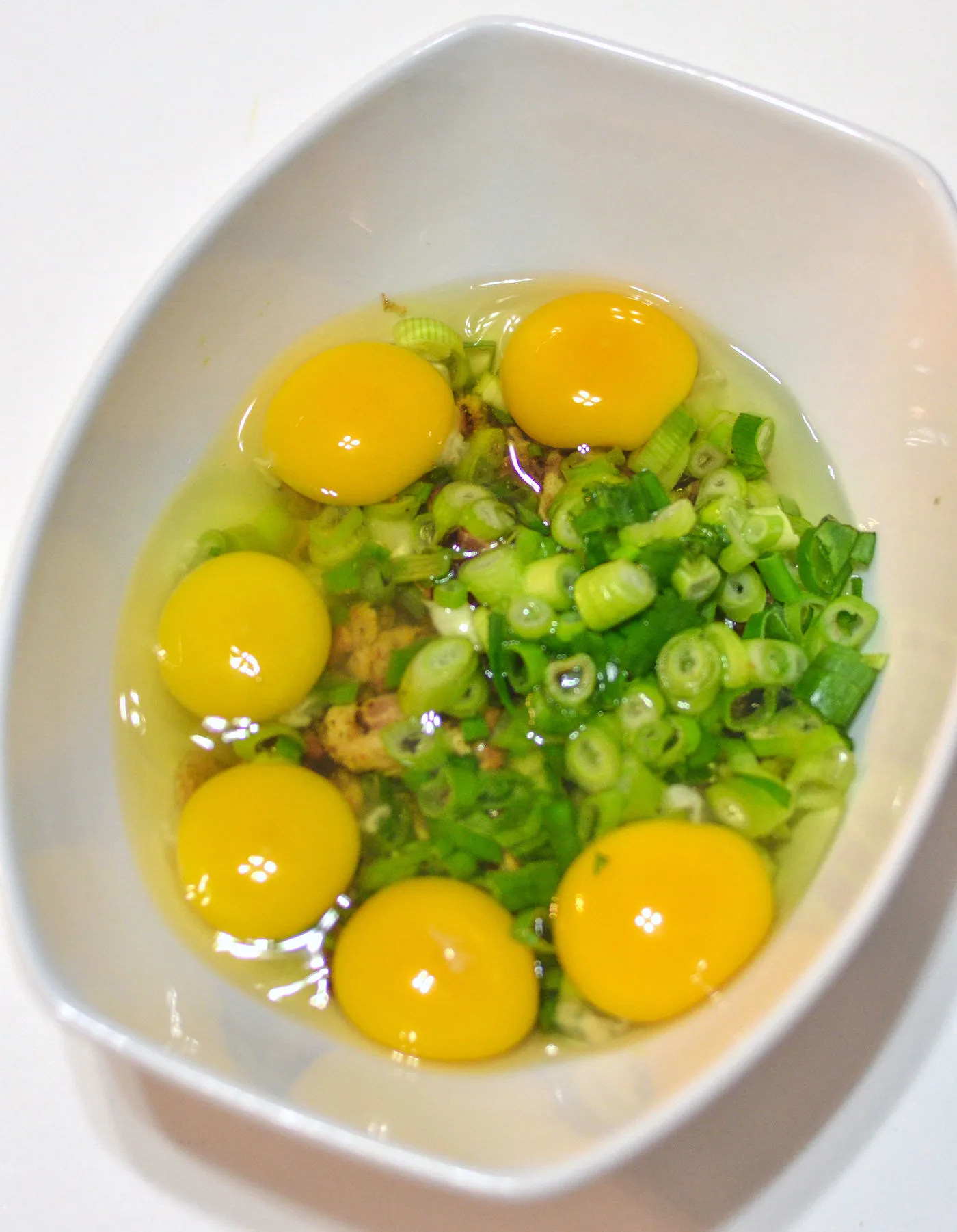 Yolks, green onions, meat, and other ingredients