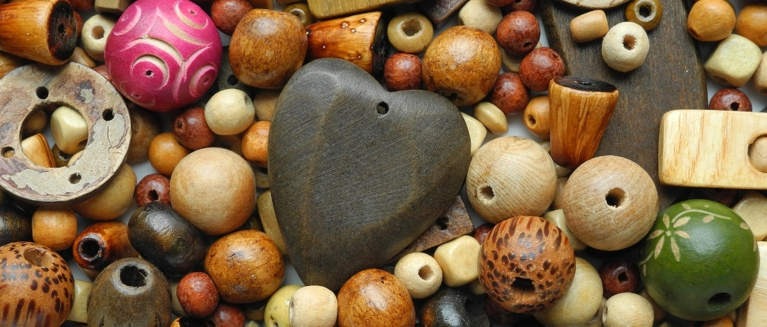 pile of wood beads in various shapes and sizes