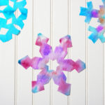 making snowflakes with coffee filters