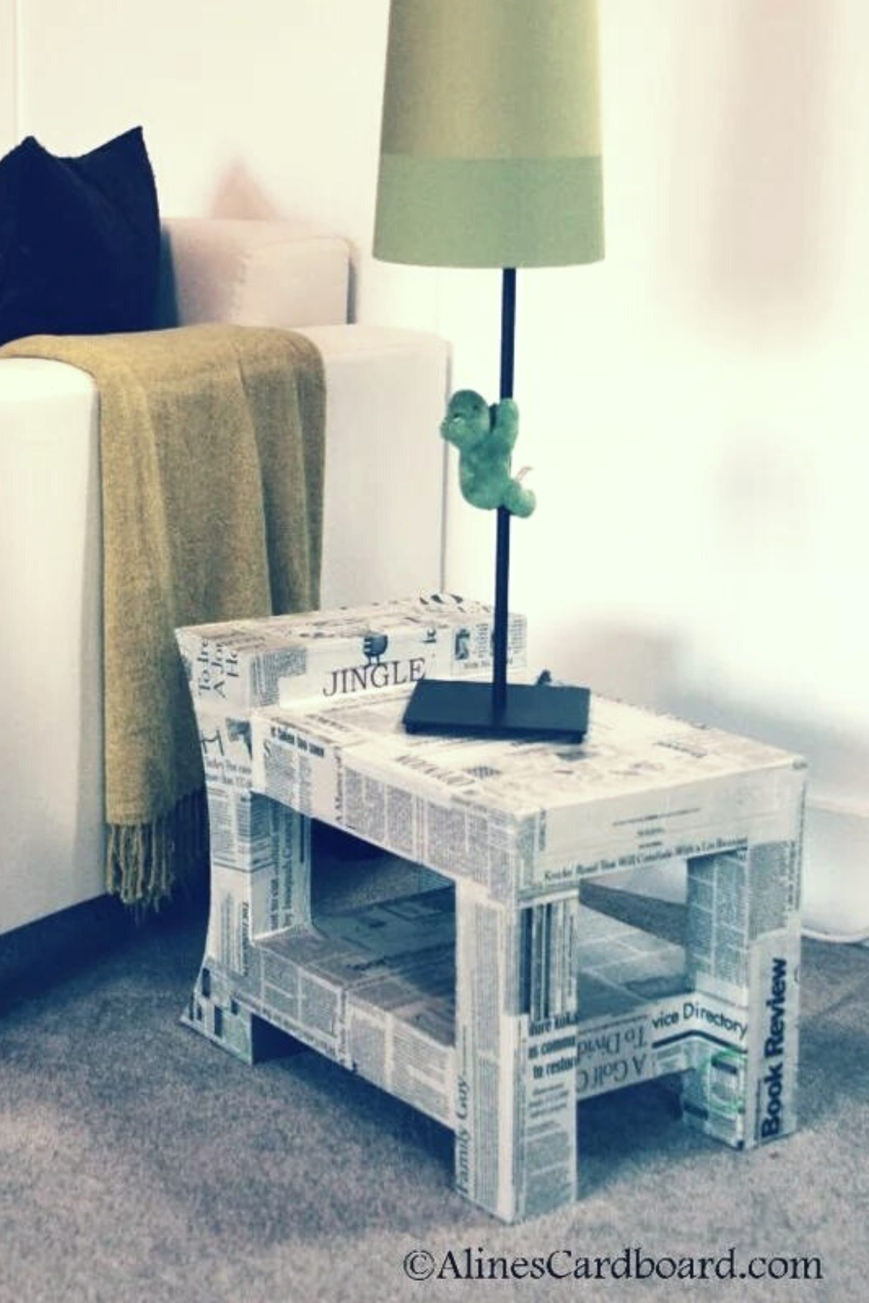 newspaper and cardboard side table