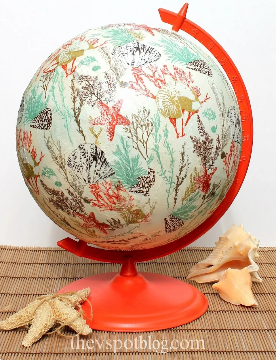 coastal inspired globe makeover using paper napkins & Mod Podge