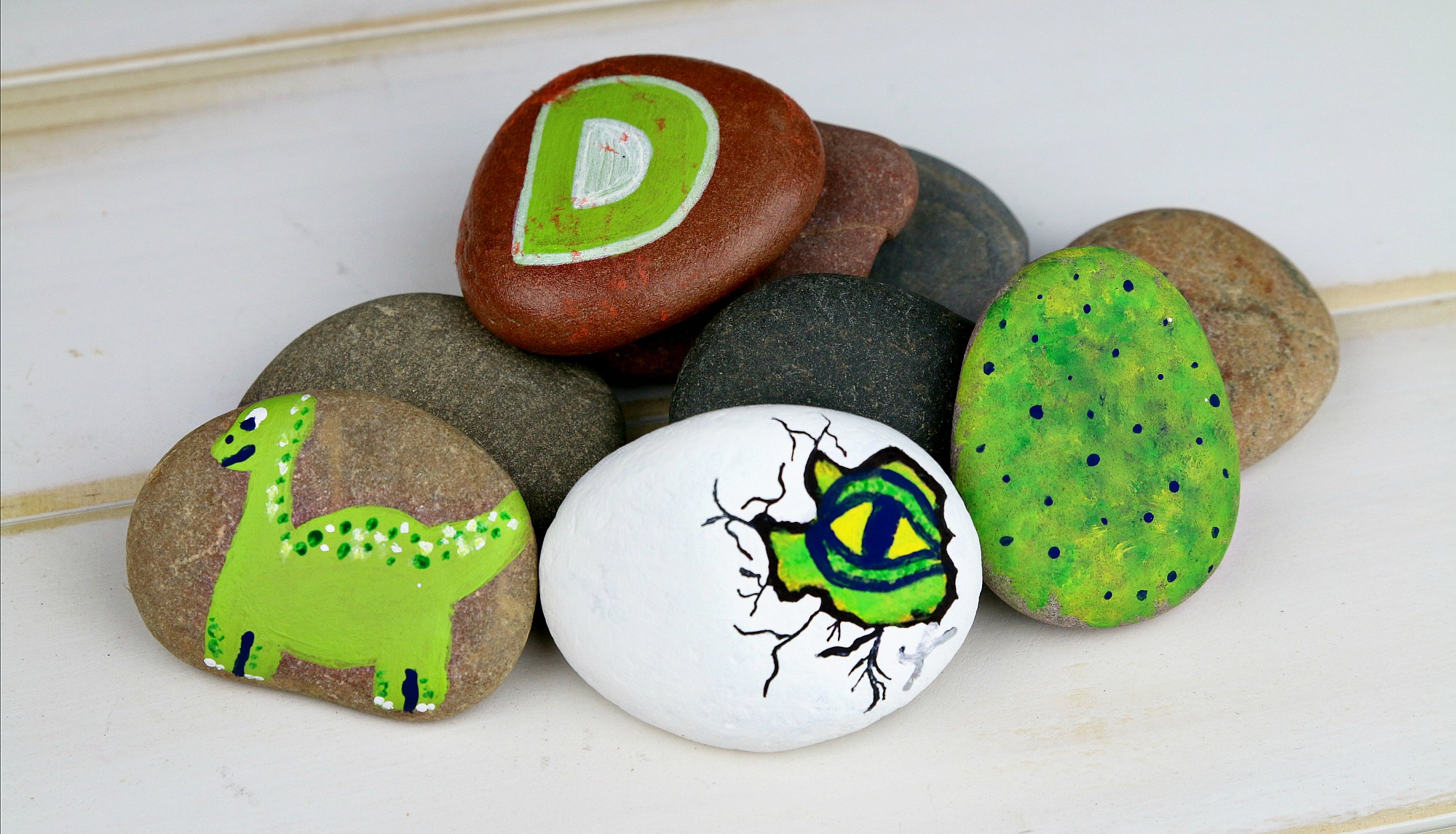 the good dinosaur themed rock painting