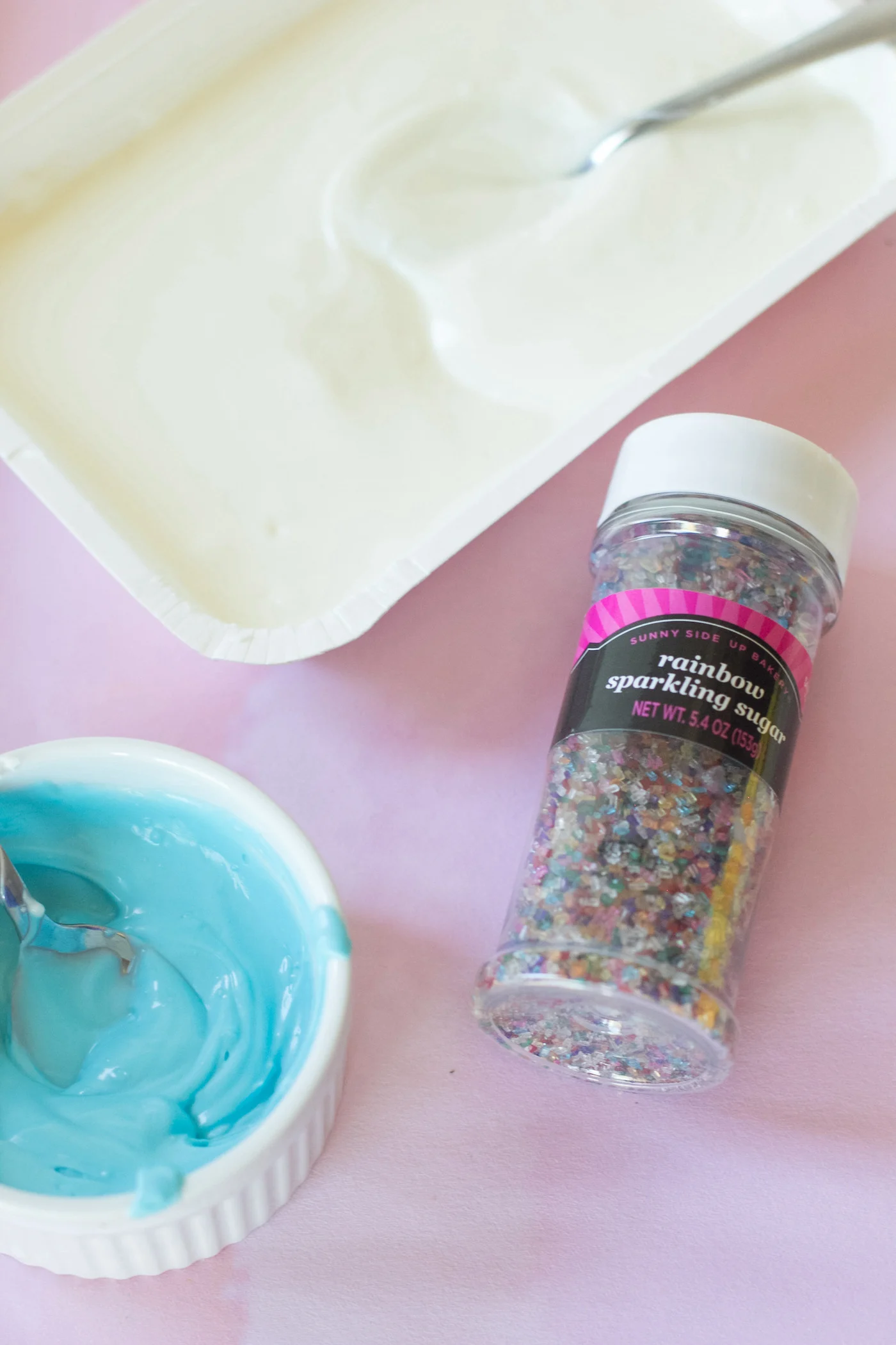 Melted blue and white candy melts with sprinkles