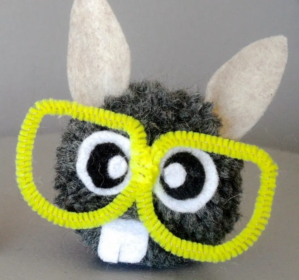 pom bunny with pipe cleaner glasses