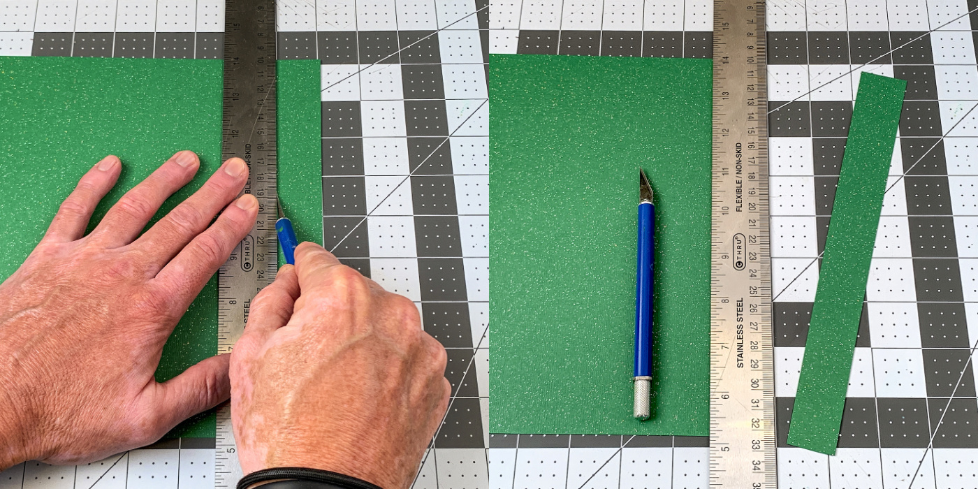 Cutting green paper strips with a craft knife