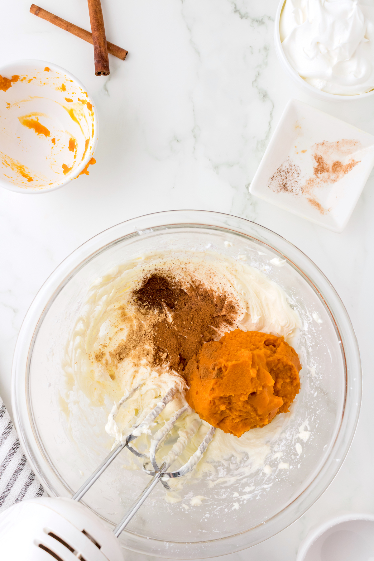 Adding pumpkin and spices to the dip mixture