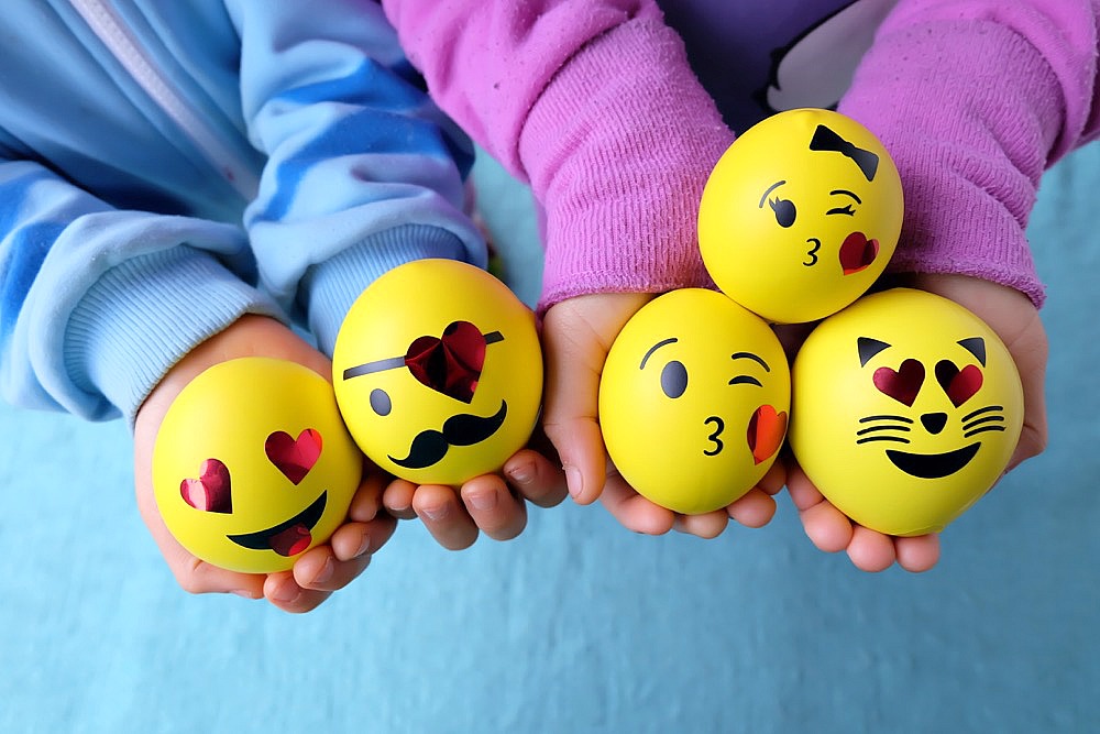 DIY Emoji Squishy Stress Balls Filled With Slime