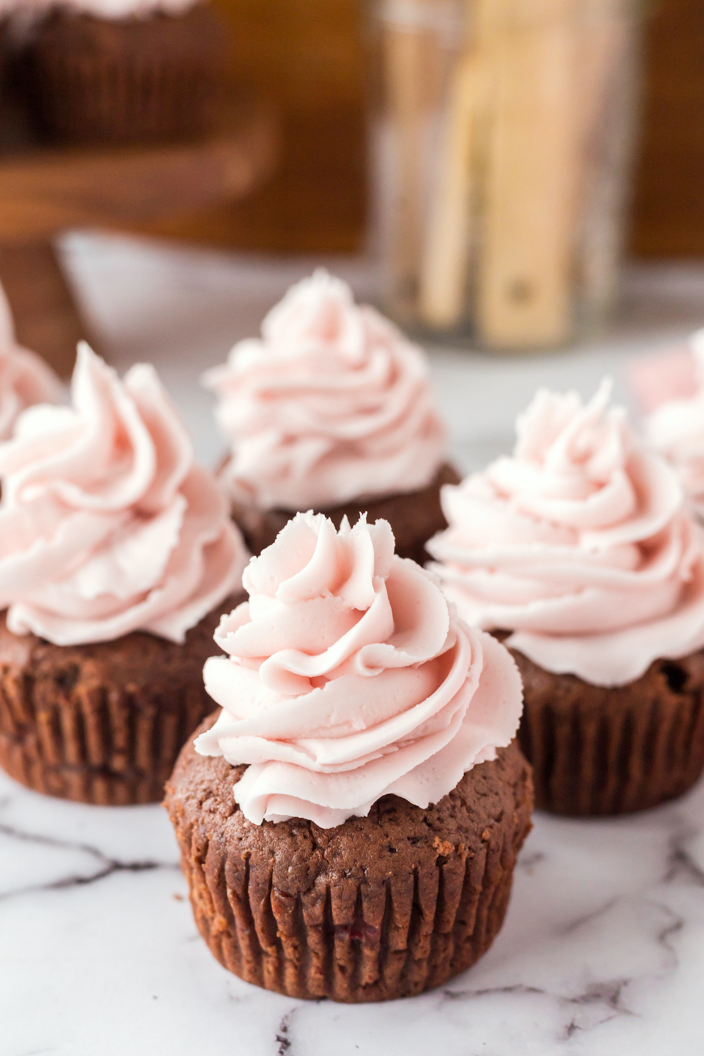 chocolate cherry cupcakes with cherry frosting