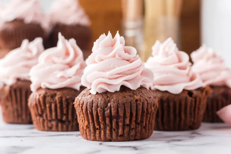 chocolate cupcakes with cherry frosting