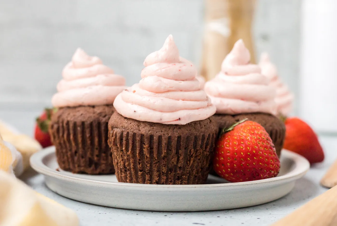 plate of nutella cupcakes with strawberry frosting