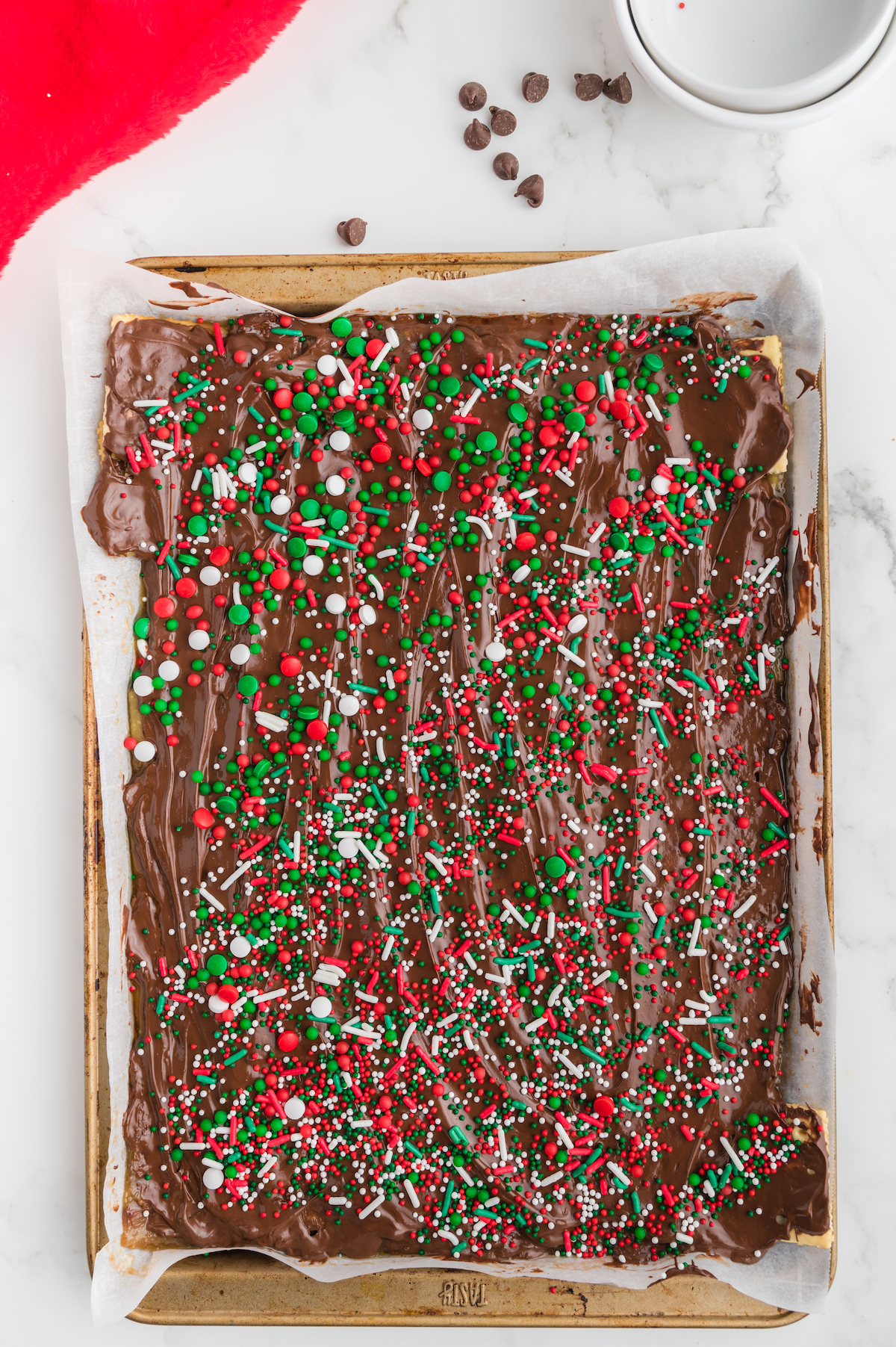 Christmas sprinkles added to the wet chocolate