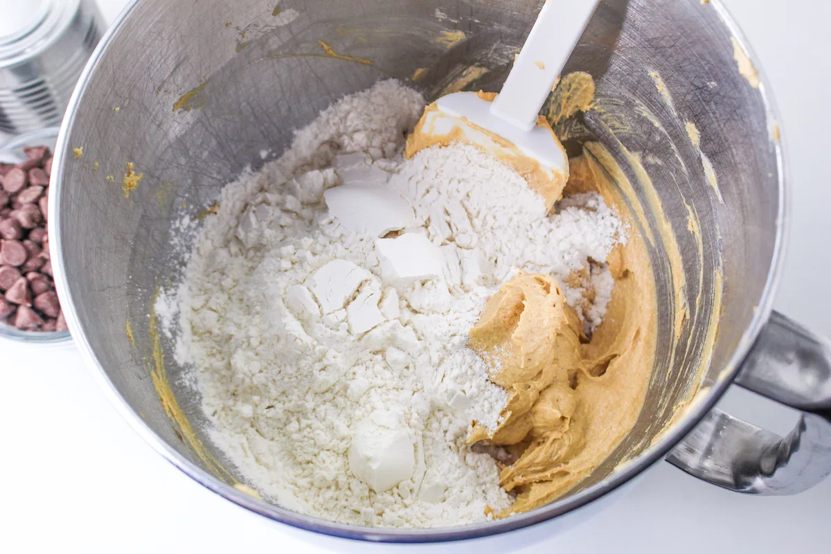 Dry ingredients added to the peanut butter cookie mixture