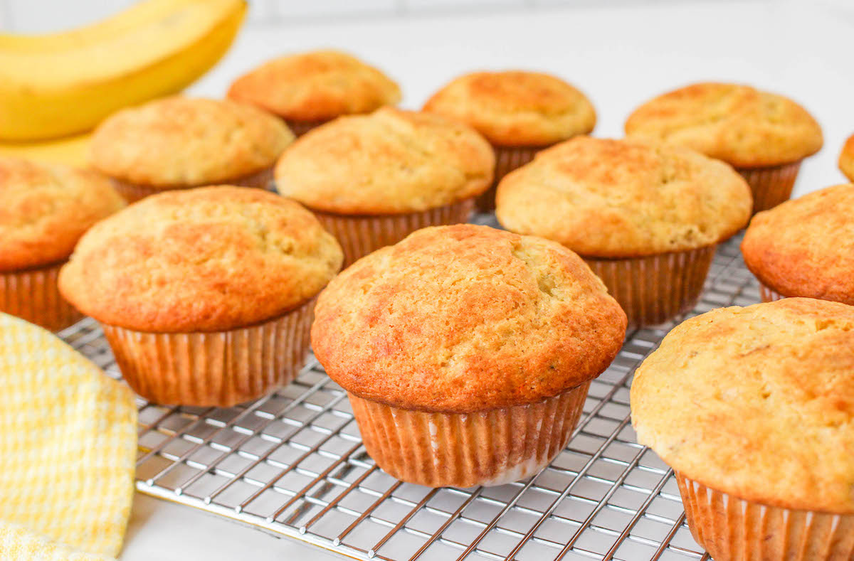 baked banana muffins with cake mix on a wire rack cooling
