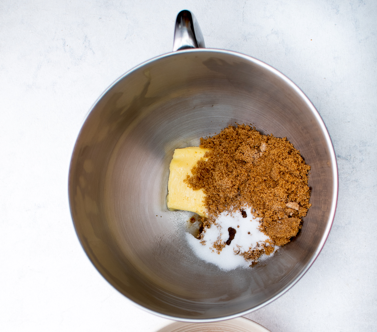 butter, granulated sugar, brown sugar, and vanilla extract in a bowl