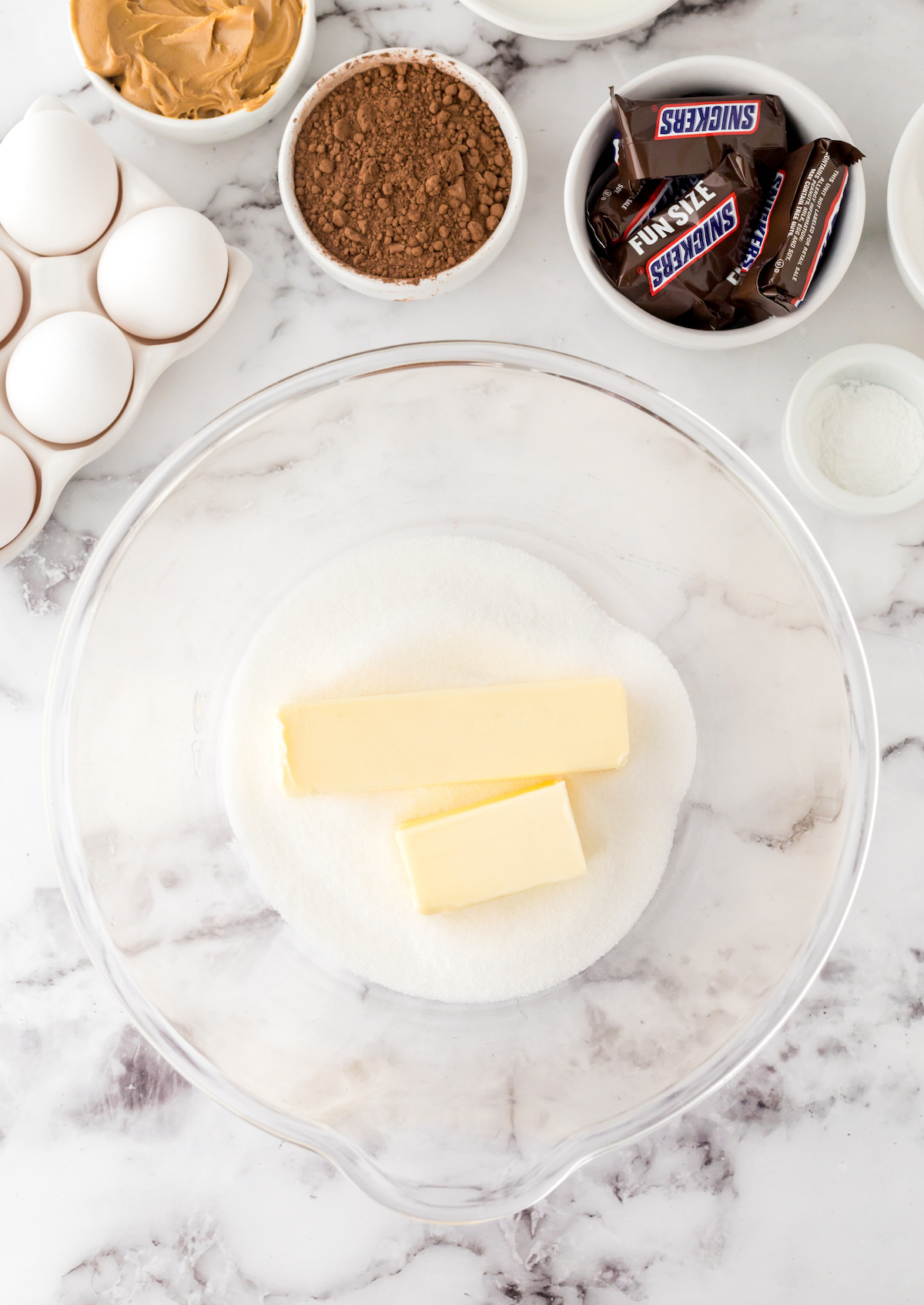 cream the butter and sugars together in a glass bowl