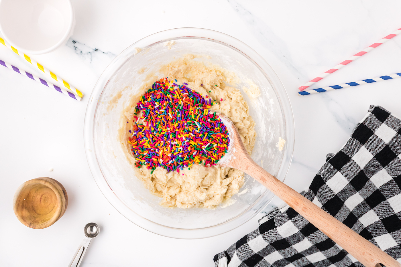 sprinkles poured into the cookie batter bowl
