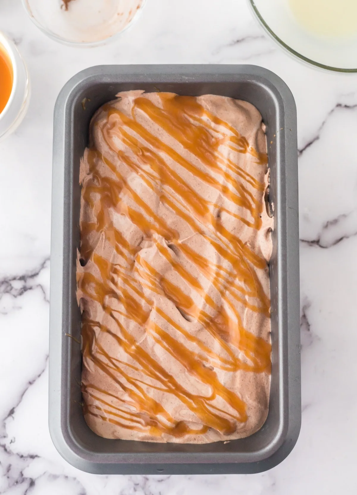 Chocolate ice cream with caramel drizzled over the top