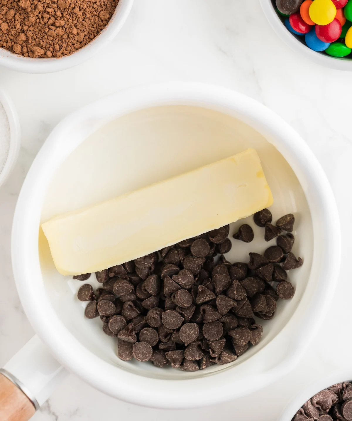 Butter and chocolate chips together in a white sauce pan