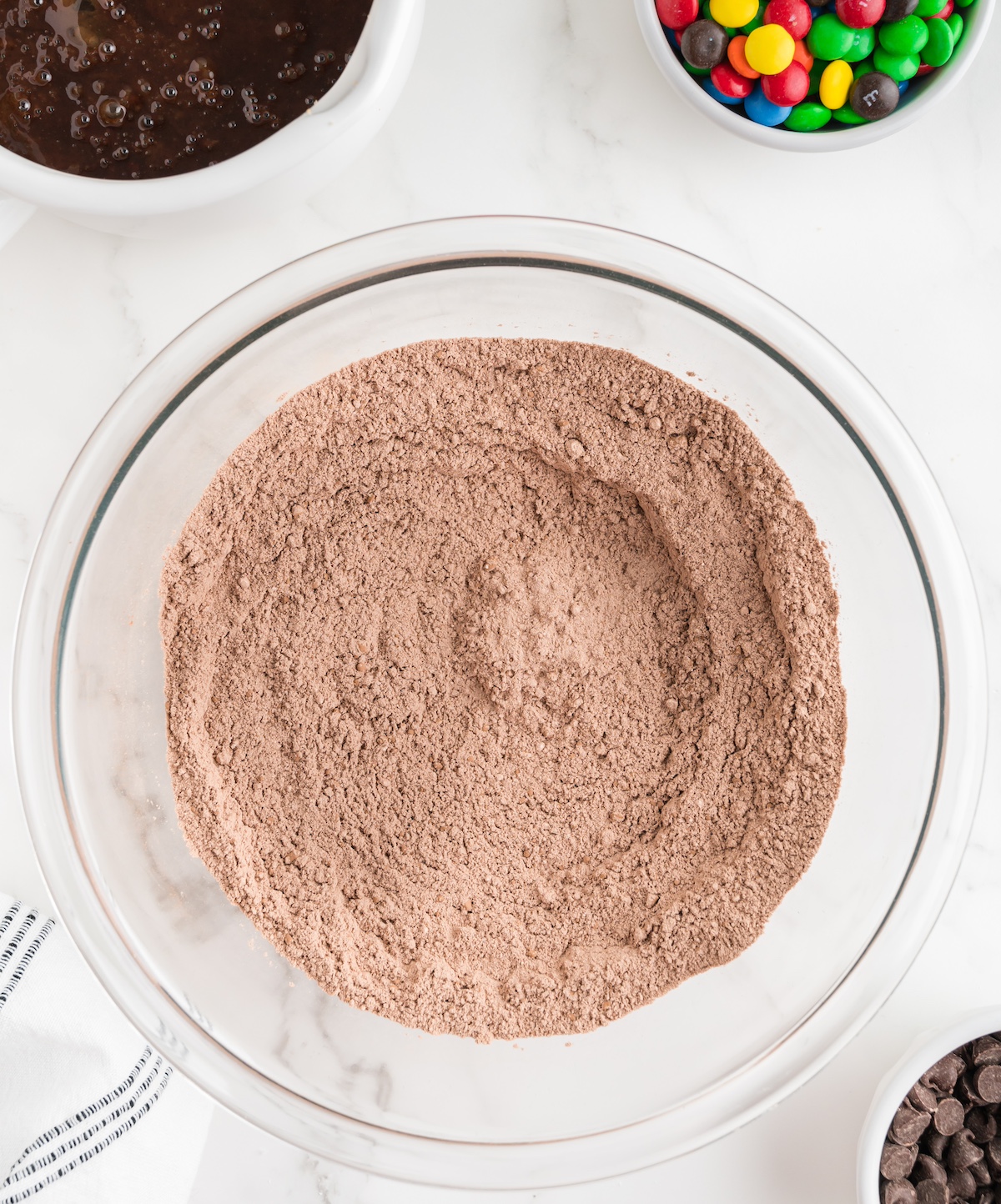Cocoa powder, flour, salt, and baking powder whisked together in the bowl