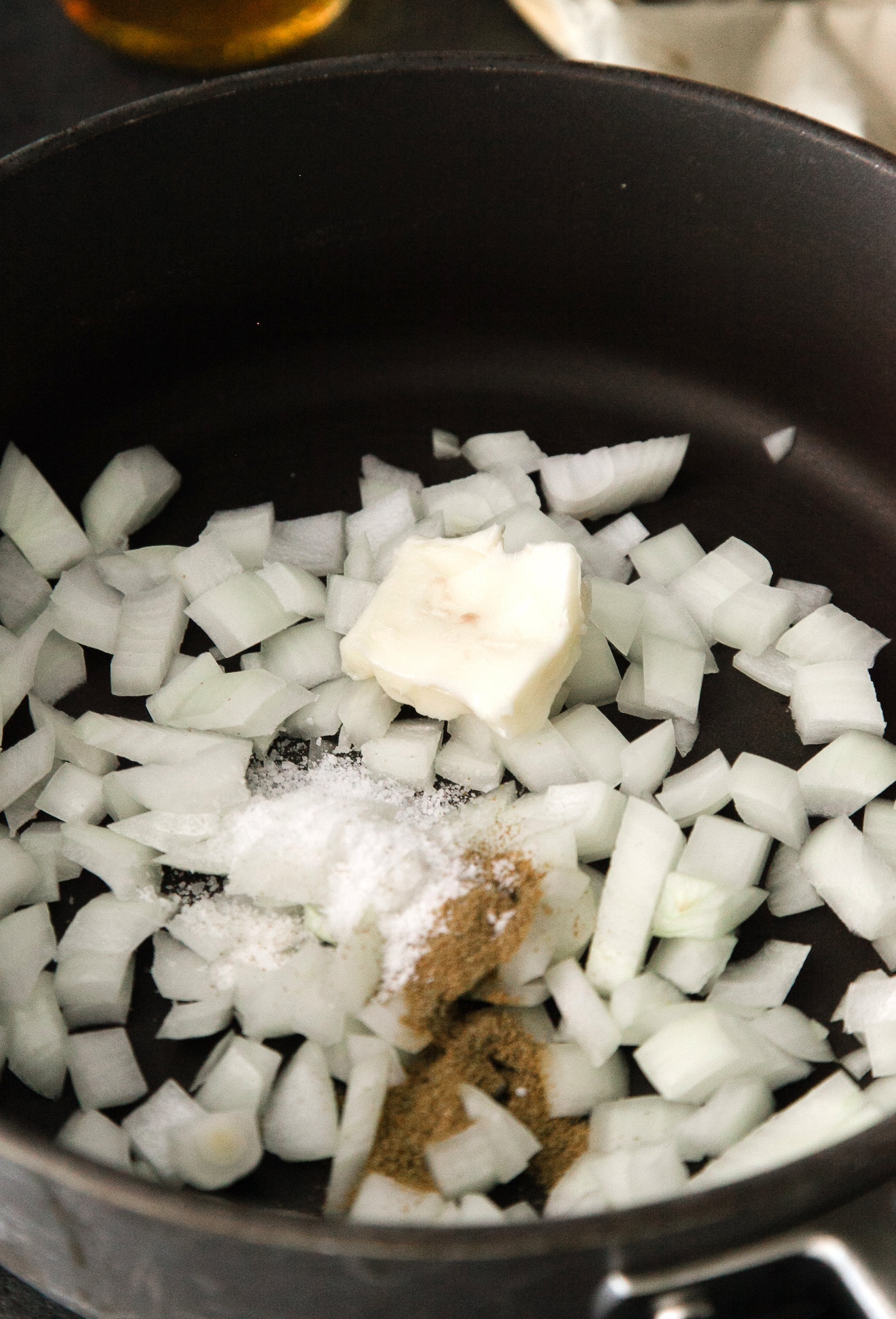 Diced onions with salt, olive oil, and garlic powder