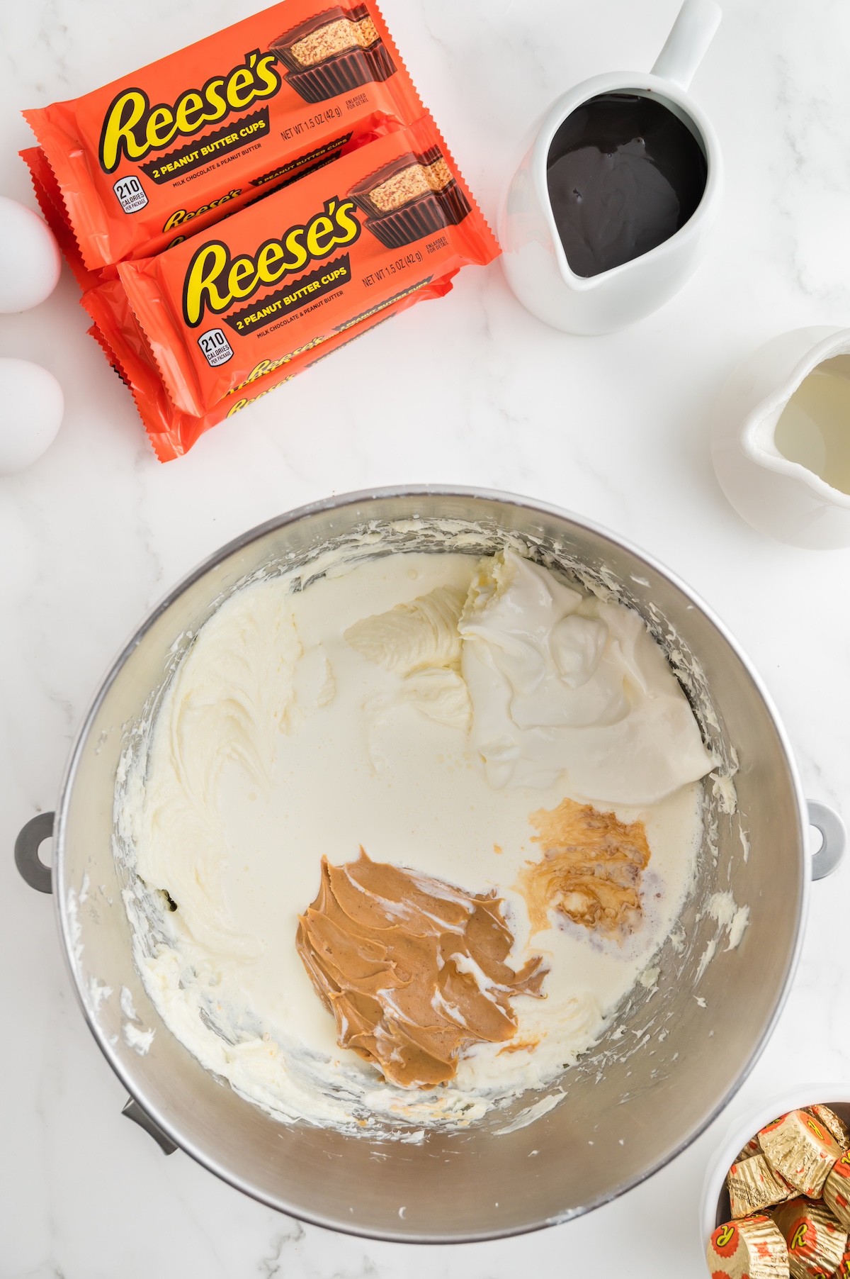 Heavy cream, peanut butter, sour cream, and vanilla added to the mixture